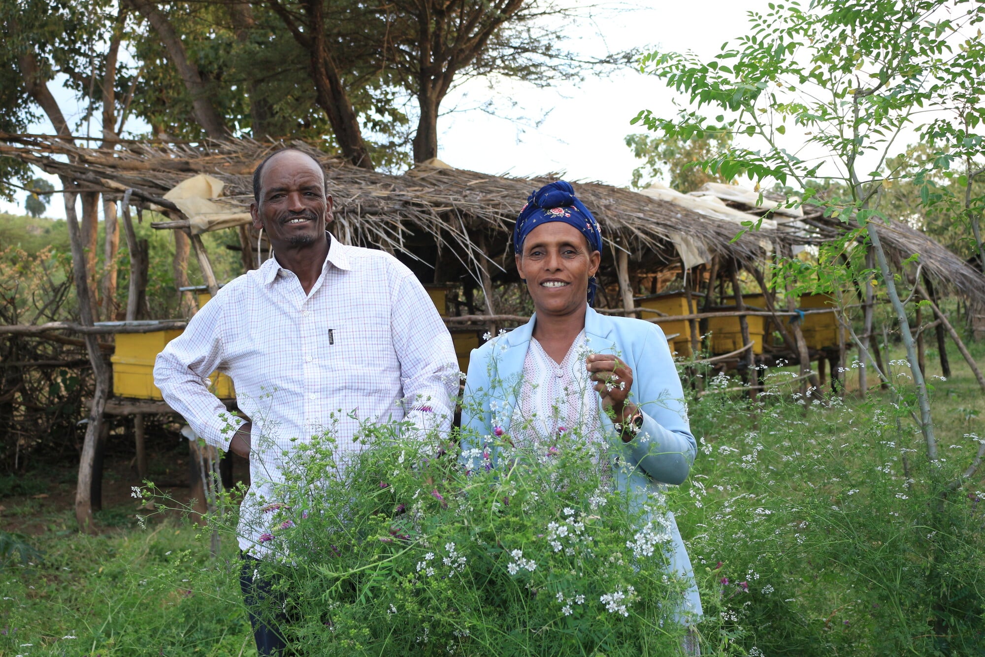 man and woman on farm in Ethiopia