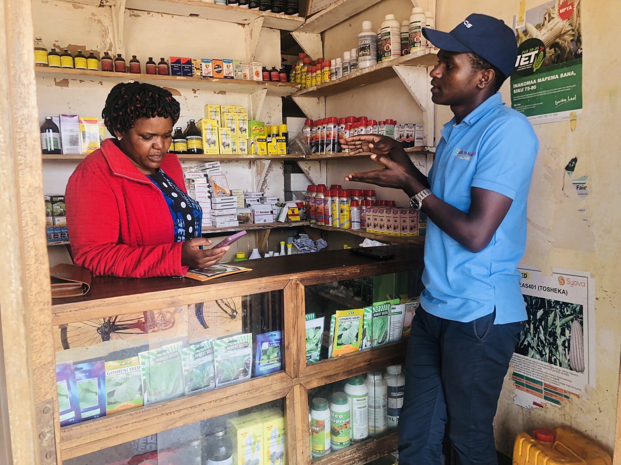 Jenipher from Manyara in Tanzania selling improved seeds and pesticides.